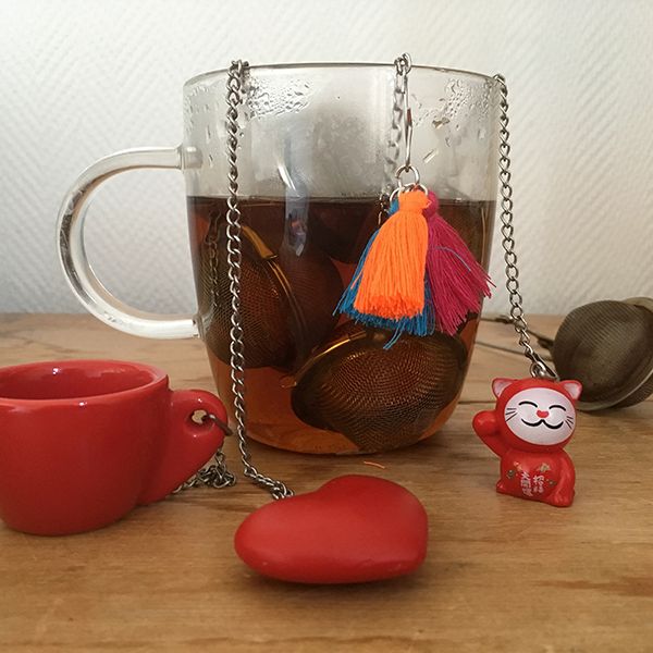 Passoire à thé à poignée poussoir - Infuseur à thé en acier